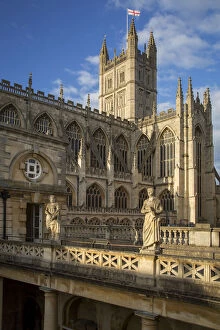 Abbey Gallery: Bath Cathedral towers over the open air Roman Baths