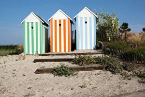 Images Dated 21st September 2014: Beach Huts on a traffic roundabout