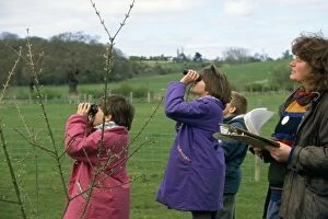 Binoculars Gallery: BIRD WATCHING - children, on a family wildlife weekend