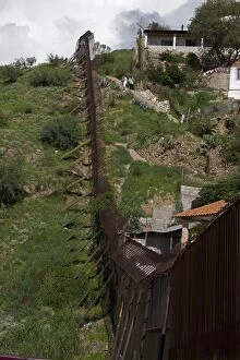 Images Dated 23rd July 2008: Border fence between Nogales Sonora Mexico (right) and Nogales Arizona USA