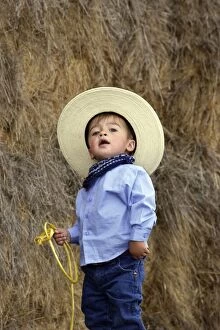 Images Dated 2nd September 2005: Boy playing at being a cowboy