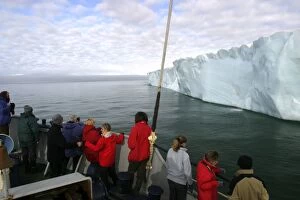Brasvells Glacier - 200 km long. Tourists on boat