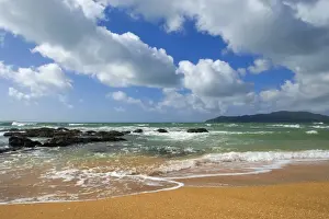 Cable Bay waves rolling in on the golden beach of Cable Bay before a thunderstorm Cable Bay, Doubtless Bay, Northland, North Island, New Zealand