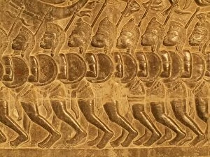Cambodia - Bas-reliefs of warriors at the west