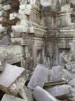 Cambodia - Collapsed blocks of stone from a temple