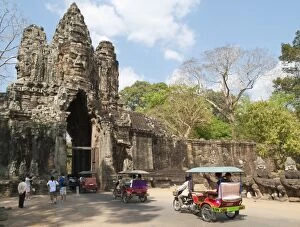 Cambodia - Tuk-tuks at the South Gate of Angkor