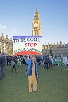 Images Dated 6th December 2008: Campaigner with banner on Climate Change March