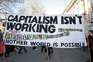 Images Dated 6th December 2008: Campaigners with ҃apitalism isn't workingӠbanner