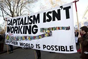 Demonstration Gallery: Campaigners with Capitalism isn't working banner