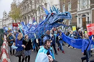 Crowd Gallery: Campaigners with Welsh dragon on The Wave Climate Change