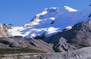 Images Dated 15th December 2005: Canada - Glacial deposits at snout of retreating glacier. Road below Mount Athabasca with Bus