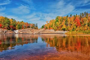 Images Dated 25th May 2021: Canada, Ontario, Chutes Provincial Park. Reflections on Aux Sables River in autumn. Date: 08-10-2019