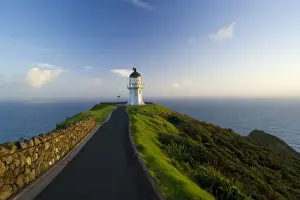 Headland Prints: Cape Reinga northernmost tip of New Zealand with Cape Reinga Lighthouse in early morning light Northland