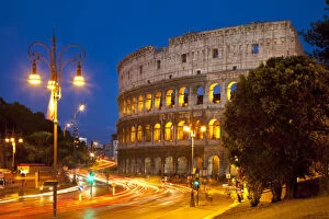 Avenue Gallery: Car light-trails in front of the Roman Coliseum