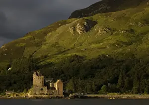 Castle by water and mountain