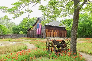 Castroville, Texas, USA. (Editorial Use Only) Large American flag on a barn in the Texas Hill Country. (Editorial Use Only) Date: 12-04-2021