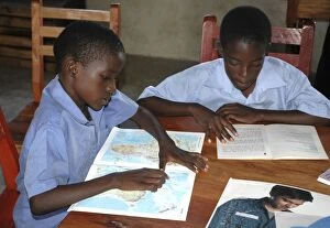 Children at Equatorial College School - reading books