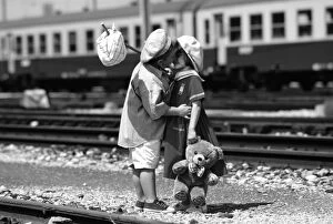 Children kissing at Railway