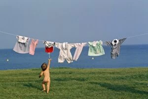 Boys Gallery: Children - naked child chasing washing