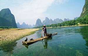Boat Collection: China - fisherman with Cormorant birds. Li River, Guangxi Zhuangzu Province