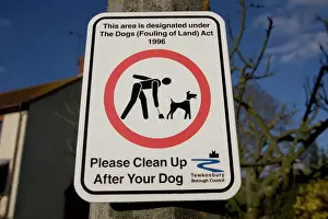 Signs Prints: Please clean up after your dog sign