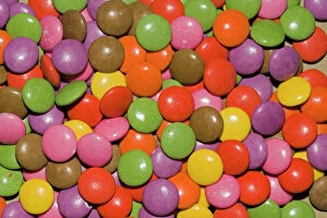 Colour Collection: Closeup of group of colourful circular smarties UK