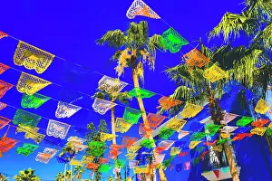 Street Prints: Colorful Mexican Christmas paper decorations. San Jose del Cabo, Mexico Date: 29-12-2020