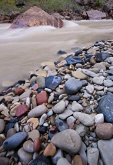 Colorful rocks on the edge of the rushing