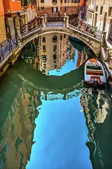 Bridge Prints: Colorful small canal and bridge creates beautiful reflections in Venice