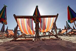 Images Dated 21st June 2012: Colourful beach umbrellas and deckchairs for a summer ho