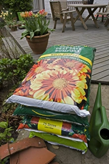 Images Dated 22nd April 2007: Compost - large bags of peat free multipurpose organic compost in garden. Cotswolds - UK