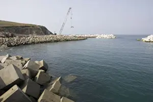 Verde Prints: Constructing new breakwater outside harbour Puerto de Vega Costa Verde Northern Spain