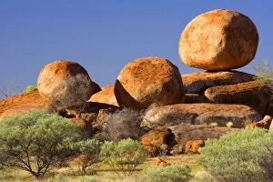 Images Dated 16th June 2008: Devils Marbles - three nearly perfectly circular shaped boulders of red granite balanced on still