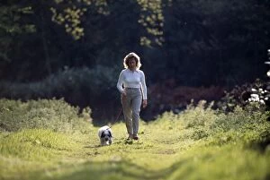 Exercising Gallery: Dog - Polish lowland sheepdog on lead, being walked