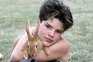 Images Dated 1st July 2004: Domestic Rabbit - being held by child