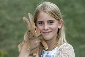 Images Dated 1st July 2004: Domestic Rabbit - being held by girl