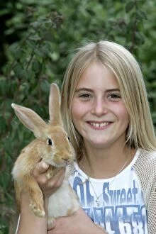 Images Dated 1st July 2004: Domestic Rabbit - being held by girl