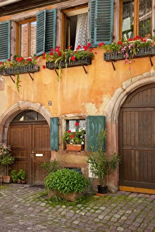 Alley Gallery: Front doors to home in Riquewihr, along