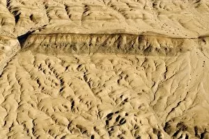 Drainage patterns blocked by a black dolerite dyke