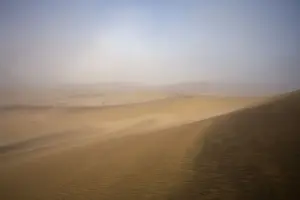 Dunes in the mist Dune Belt near Walvis Bay Namibia, Africa