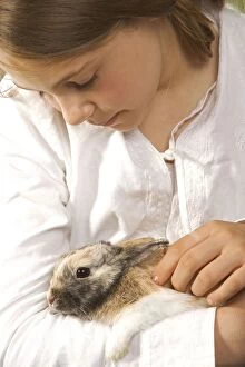 Images Dated 11th August 2007: Dwarf Rabbit - being held by girl
