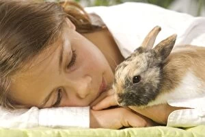 Images Dated 11th August 2007: Dwarf Rabbit - with young girl