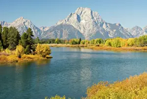 Early morning sun on Grand Teton range from oxbow bend Grand Teton NP, USA
