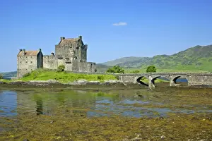 Lochs Prints: Eilean Donan Castle view of castle located in Loch Duich at low tide on a sunny day Kyle of Lochalsh