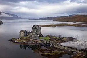 Road Prints: Eilean Donan Castle - with view of Loch Alsh and mountains in the backround - November - Scotland