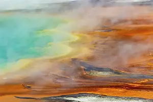 Elevated view of patterns in bacterial mat around Grand Prismatic spring, Midway Geyser Basin, Yellowstone National Park, Wyoming Date: 02-10-2021