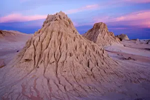 Eroded pinnacles - amazingly shaped, eroded pinnacles of the lunette Walls of China, located within the since 18000 years dried-up lakebed of Lake Mungo, at dusk