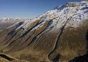 Erosion on mountains just east of the Furka Pass, south Switzerland. After first autumn snow