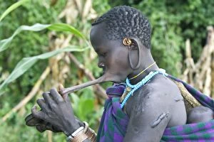 Images Dated 31st July 2006: Ethiopia - Surma Woman: tribe of south west Ethiopia