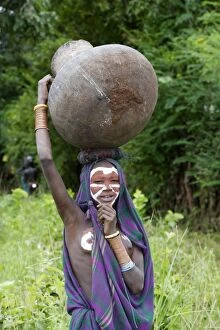 Images Dated 4th August 2006: Ethiopia - young surma girl: tribe of south west